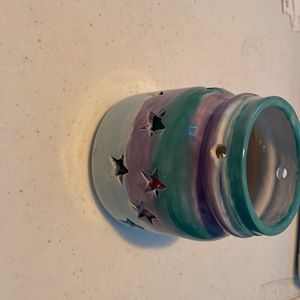 homemade clay (painted) jar.